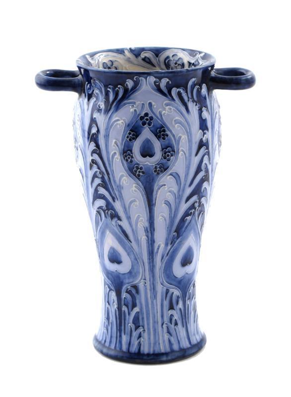 Appraisal: Peacock Feather a Florian Ware twin-handled vase designed by