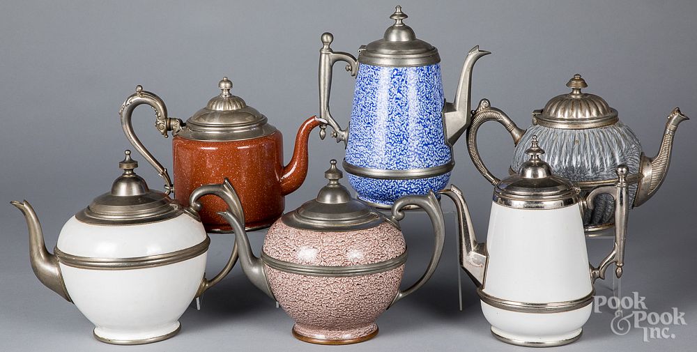 Appraisal: Six graniteware tea and coffee pots Six graniteware tea and