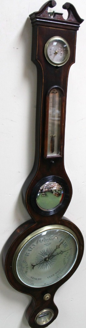 Appraisal: A late thC mahogany and boxwood strung five dial banjo