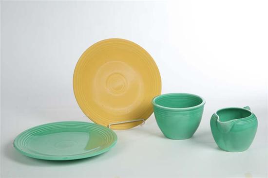 Appraisal: FOUR FIESTAWARE PIECES A green mixing bowl dia A green