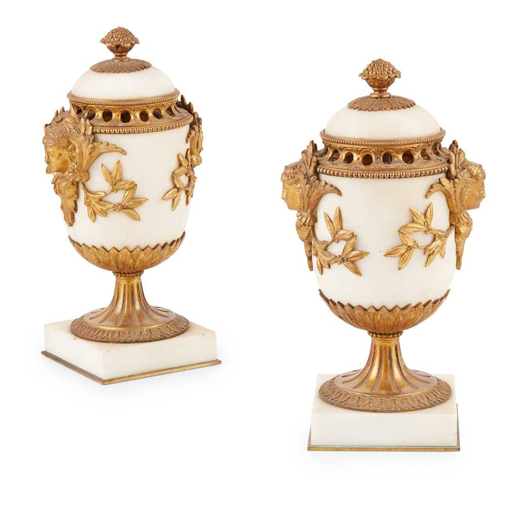 Appraisal: PAIR OF FRENCH WHITE MARBLE AND GILT BRONZE BR LE