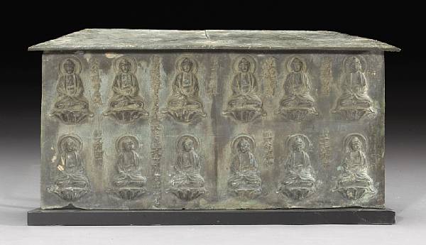 Appraisal: A fragment of a bronze plinth from a Buddhist temple