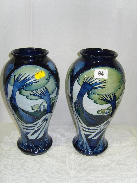 Appraisal: A pair of large Moorcroft baluster shaped vases in the