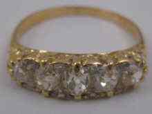 Appraisal: A yellow metal tests carat gold old brilliant cut diamond