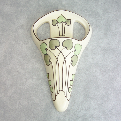 Appraisal: ROSEVILLE Ceramic Design Persian-type wall pocket painted with green spade-shaped