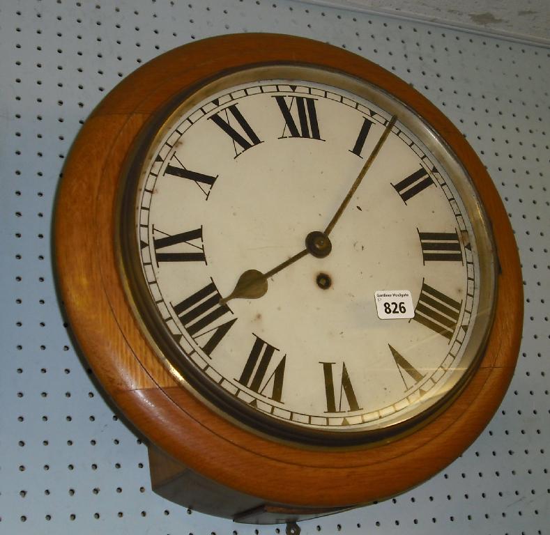 Appraisal: Oak single fusee wall dial within a turned surround