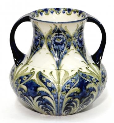 Appraisal: A FLORIAN WARE MOORCROFT POTTERY VASE of bellied form the