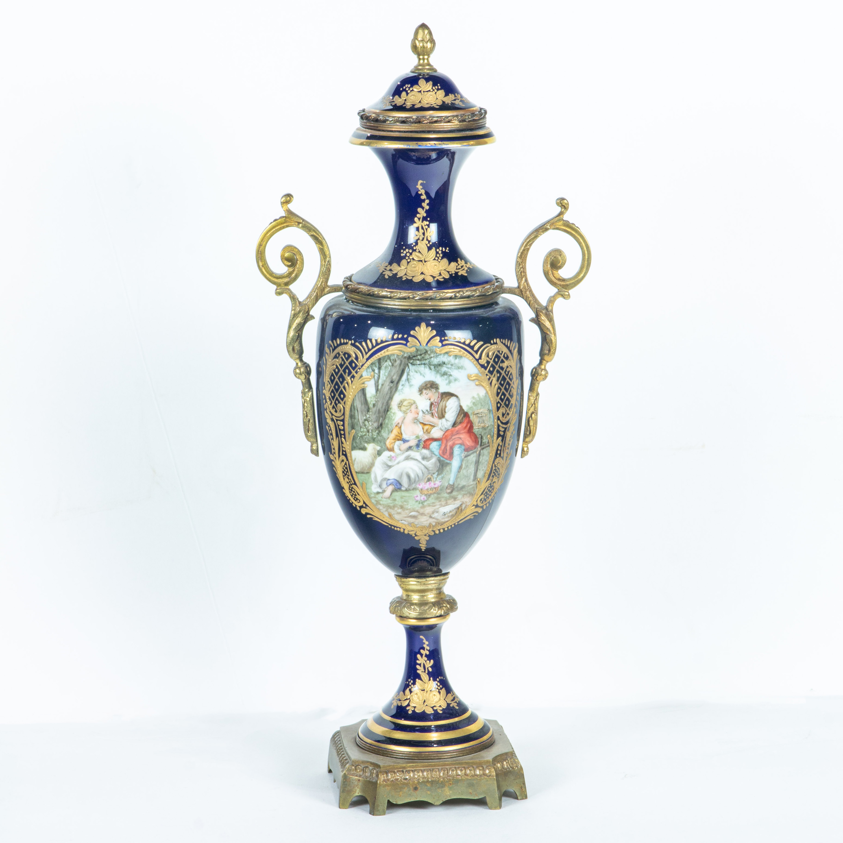 Appraisal: SEVRES STYLE PORCELAIN GILT BRASS MOUNTED COVERED URN Sevres style