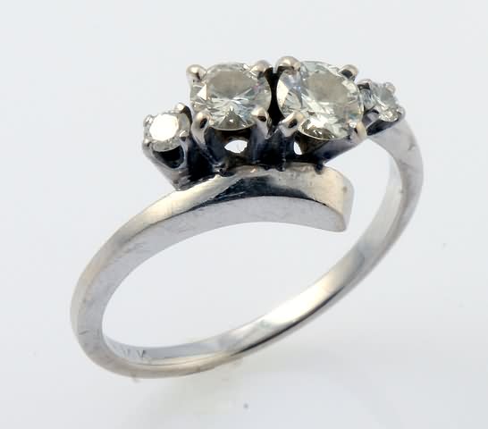 Appraisal: KW Ring with mm mm mm round diamonds Clarity VS