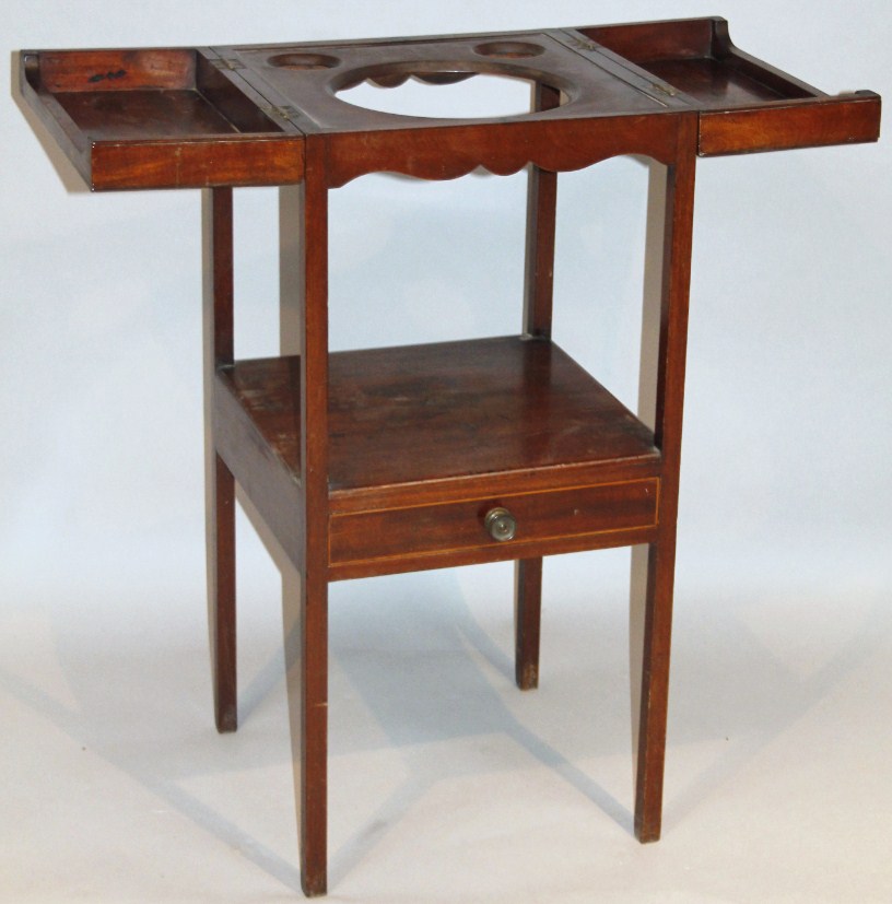 Appraisal: A George III mahogany wash stand the square top with