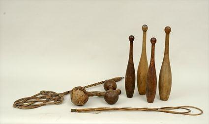 Appraisal: Four Indian Clubs Wooden Dumbbell Mallet and Two Rug Beaters