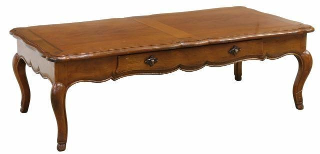 Appraisal: French Louis XV style fruitwood coffee table th c shaped