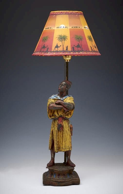 Appraisal: Cold painted figural lamp Moroccan man Cold painted figural lamp