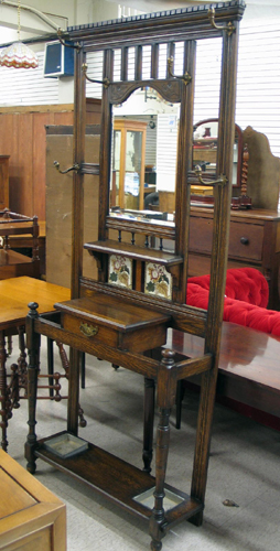 Appraisal: LATE VICTORIAN OAK HALLSTAND English c having a double umbrella