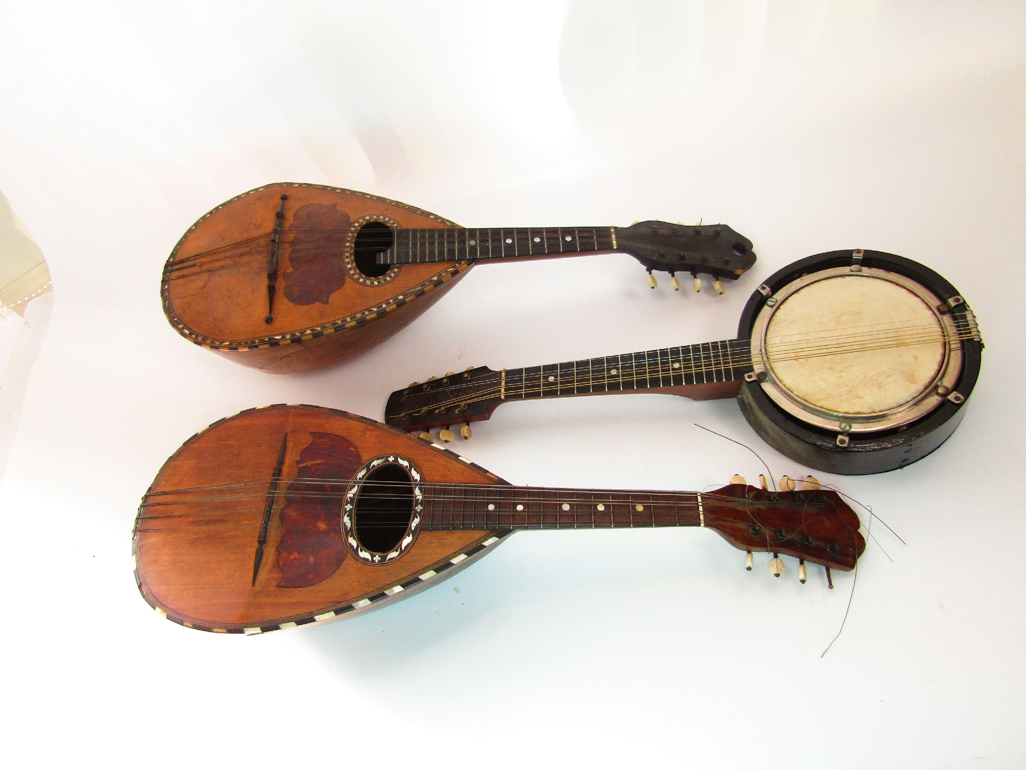 Appraisal: Two antique mandolins each with tortoiseshell mother of pearl and