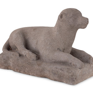 Appraisal: A Carved Stone Recumbent Dog In the Manner of Edmondson