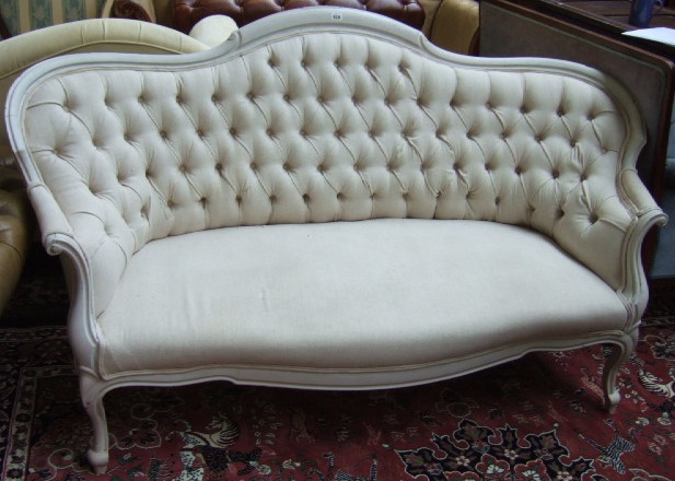 Appraisal: A white painted button down sofa