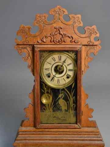 Appraisal: GINGERBREAD MANTLE CLOCK MARKED WELCHQuarter sawn oak 'Welch' mantle clock