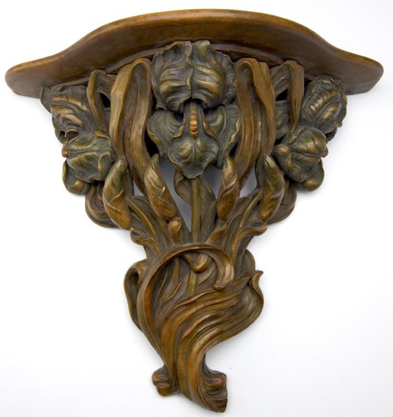 Appraisal: ART NOUVEAU WOOD BRACKET Carved and stained with iris in