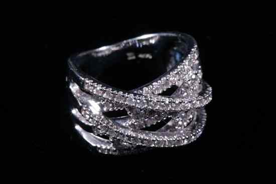 Appraisal: K WHITE GOLD AND DIAMOND OPENWORK BAND Five overlapping diagonal