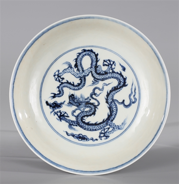 Appraisal: Chinese Blue and White porcelain dragon dish interior with elaborate