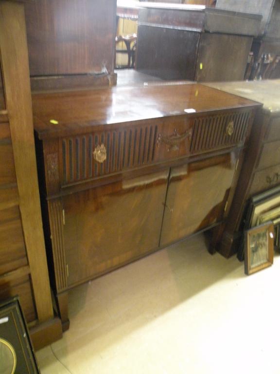 Appraisal: H Epstein of London A mahogany gramophone cabinet and a