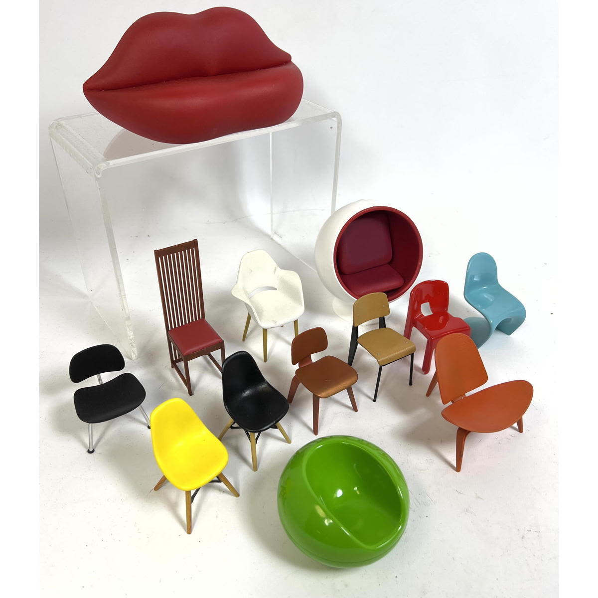 Appraisal: pc Miniature Modern Dollhouse Furniture Lips sofa Eames Barcelona Mackintosh