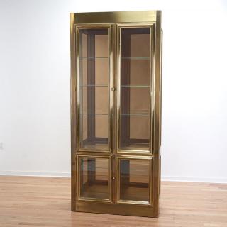 Appraisal: Mastercraft illuminated brass vitrine cabinet Mastercraft illuminated brass vitrine cabinet