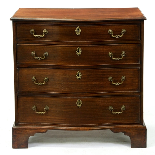 Appraisal: A George III mahogany serpentine chest of drawers on bracket