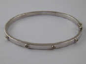 Appraisal: A carat white gold diamond bangle approx cm internal width