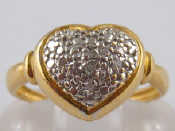 Appraisal: A yellow metal tests carat gold diamond ring designed as