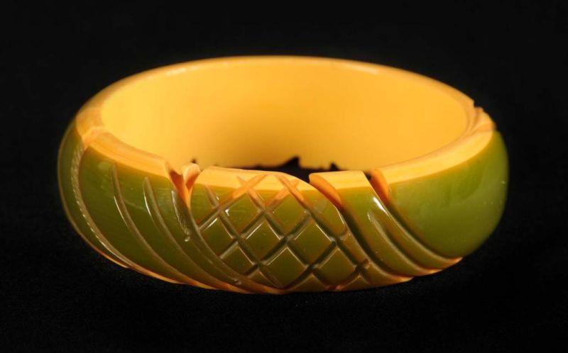 Appraisal: Bakelite Laminated Green Cream Carved Bracelet Condition Near Mint Size