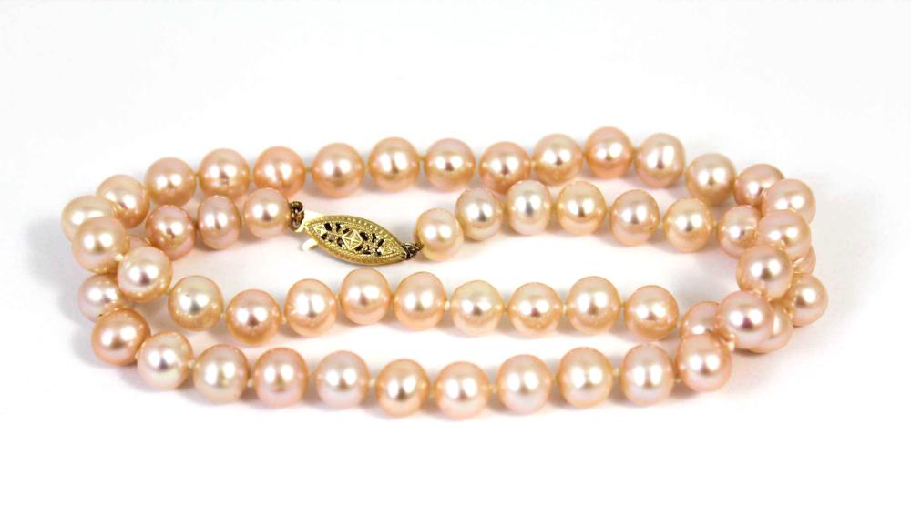 Appraisal: PINK PEARL AND FOURTEEN KARAT GOLD NECKLACE - hand-knotted strand