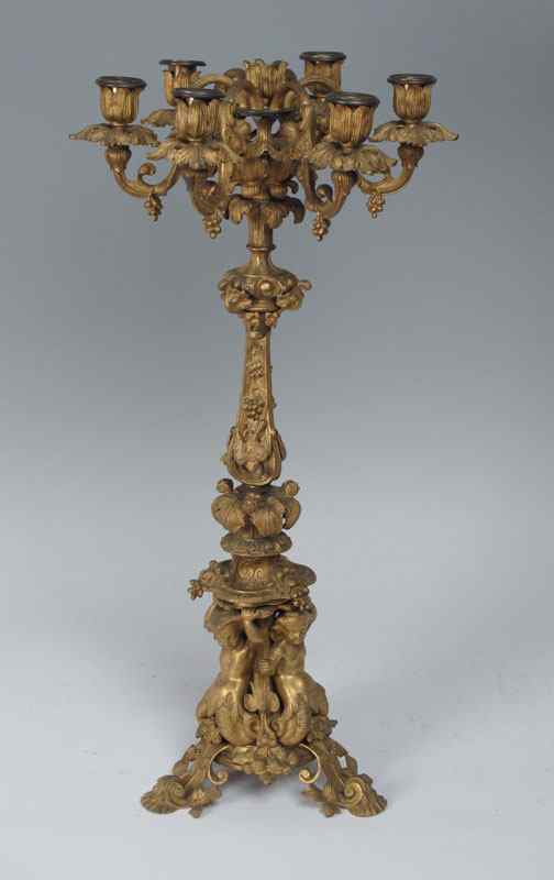 Appraisal: ORNATE BRONZE CANDELABRUM Highly detailed with figures grapes flowers and