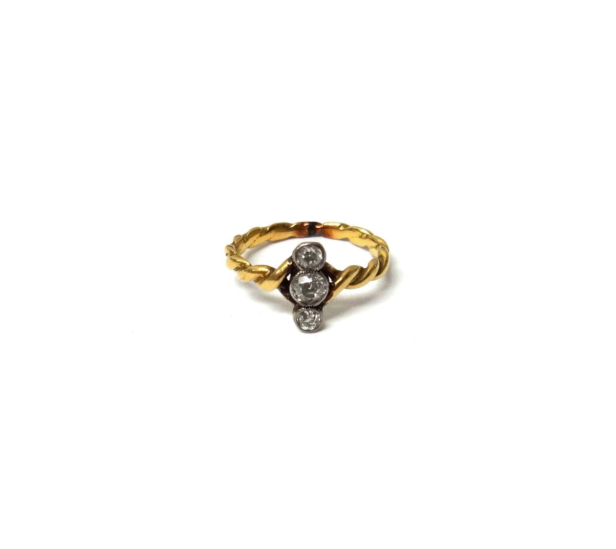 Appraisal: A gold and diamond set three stone ring mounted with