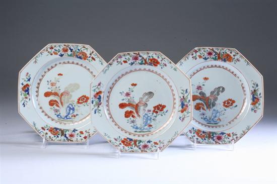 Appraisal: THREE CHINESE FAMILLE ROSE PORCELAIN OCTAGONAL PLATES circa Floral decoration