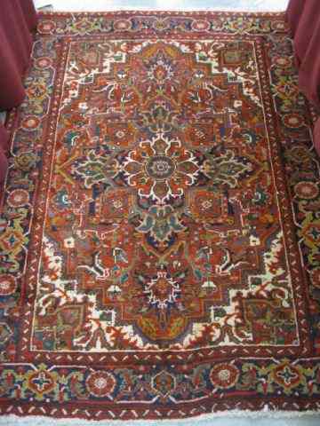 Appraisal: Heriz Persian Handmade Rug grand central medallion deep colors '