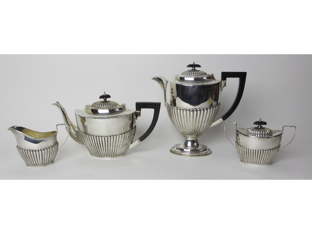 Appraisal: A four piece silver tea service of oval form with