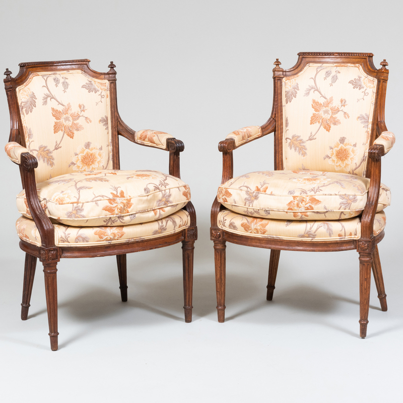 Appraisal: Pair of Louis XVI Carved Walnut Fauteuils en Cabriolet x