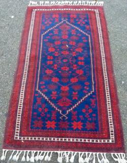 Appraisal: Persian blue ground rug with stepped medallion cm x cm