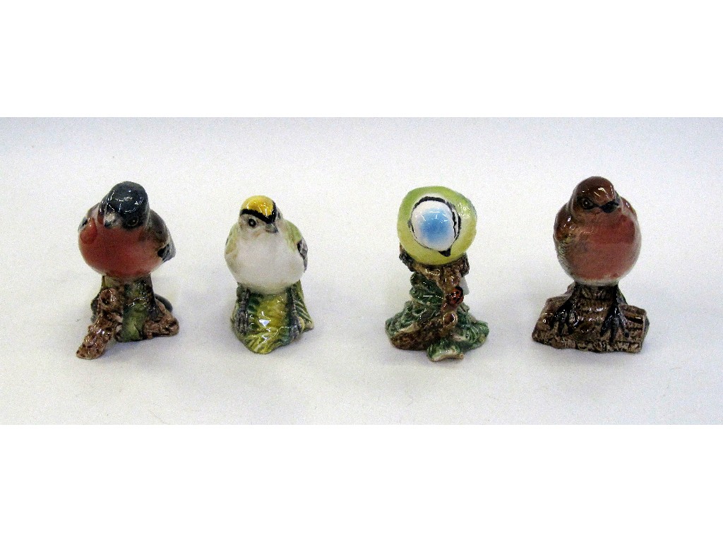 Appraisal: Four Beswick birds to include a Blue Tit Robin Goldcrest