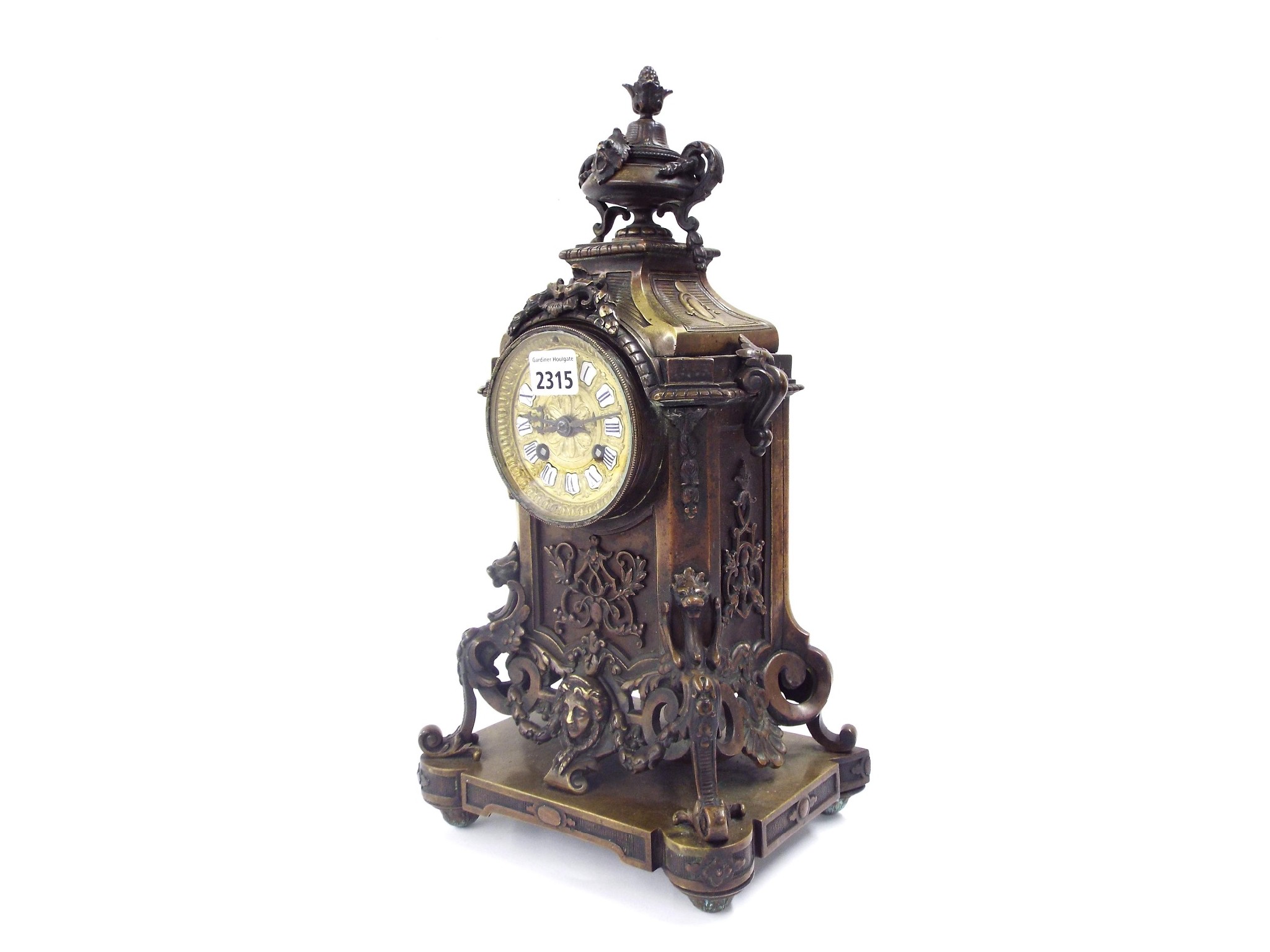 Appraisal: French two train bronze mantel clock the movement with outside