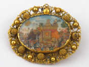 Appraisal: A th century high carat gold brooch metal pin containing