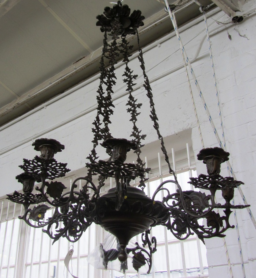 Appraisal: A William IV bronze eight light chandelier the foliate cast