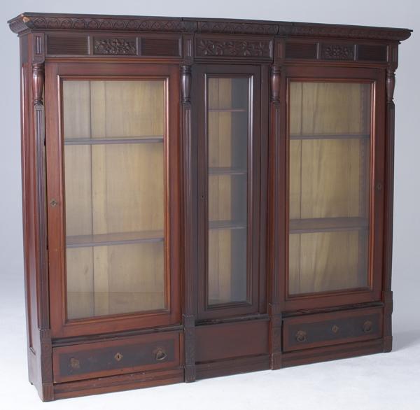 Appraisal: VICTORIAN Mahogany bookcase with three bays each with glass door