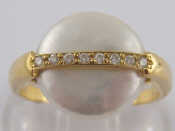 Appraisal: A yellow metal tests carat gold disc shaped cultured pearl