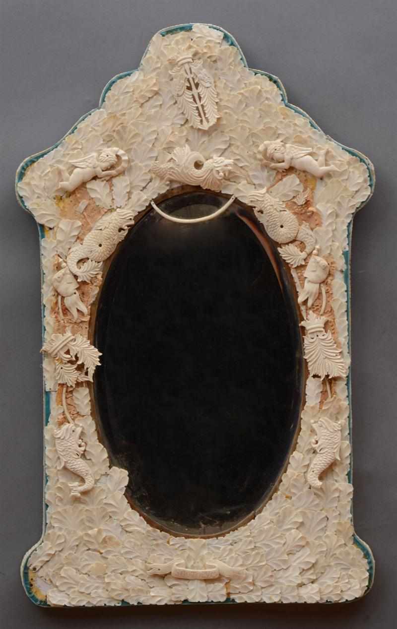 Appraisal: DIEPPE APPLIED CARVED BONE MIRROR The oval beveled plate within