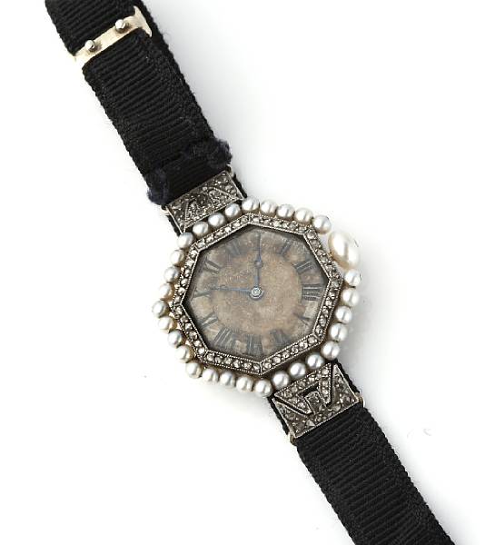 Appraisal: A platinum diamond and seed pearl wrist watch French set