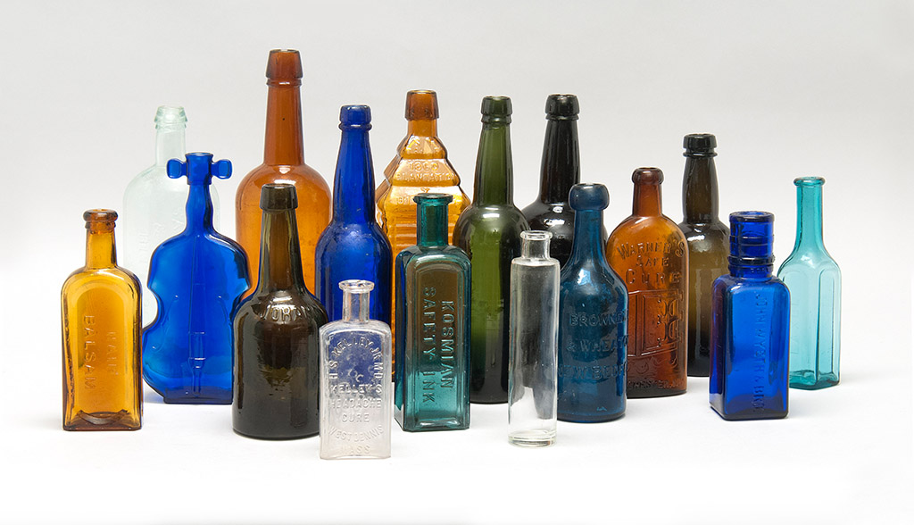 Appraisal: SEVENTEEN LATE TH EARLY TH CENTURY GLASS BOTTLES in amber