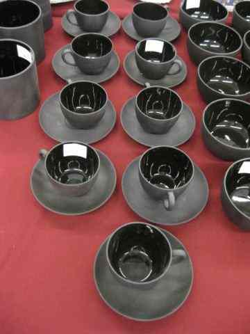 Appraisal: Wedgwood Basalt Cups Saucers glossy interiors excellent